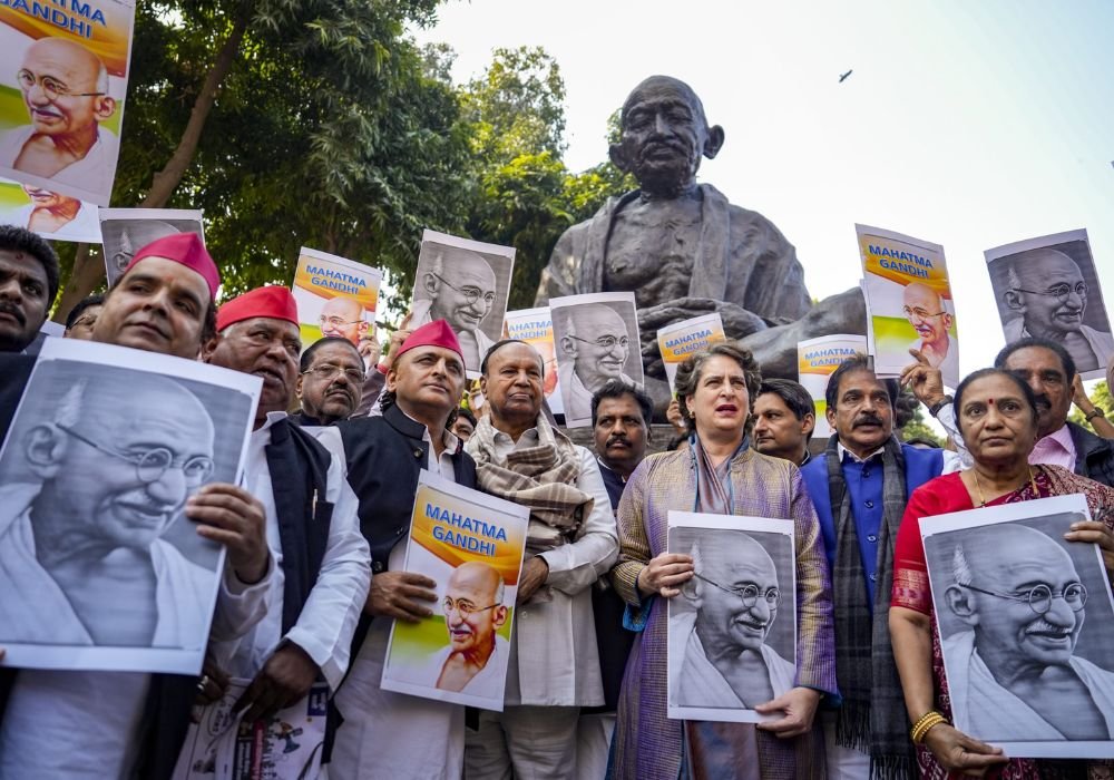 Opposition MPs protest against the removal of Mahatma Gandhi name